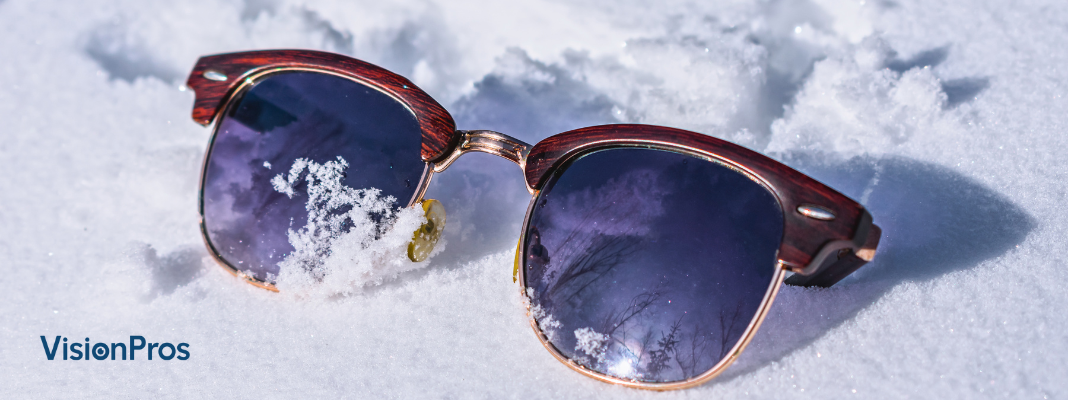 Sunglasses on snow.